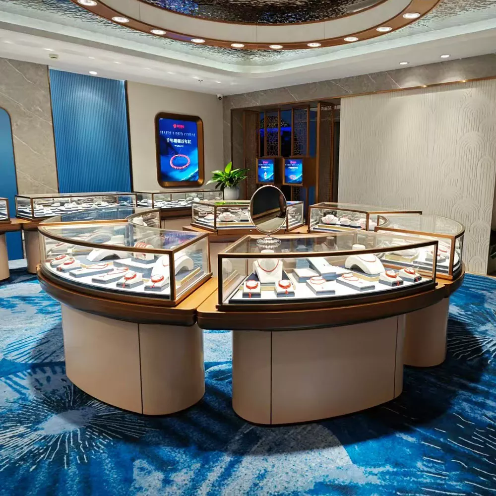 Quali sono gli effetti di illuminazione e le tecniche di visualizzazione della tabella dei display di gioielli?